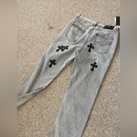 chrome hearts x comme des garçons appliqué jeans